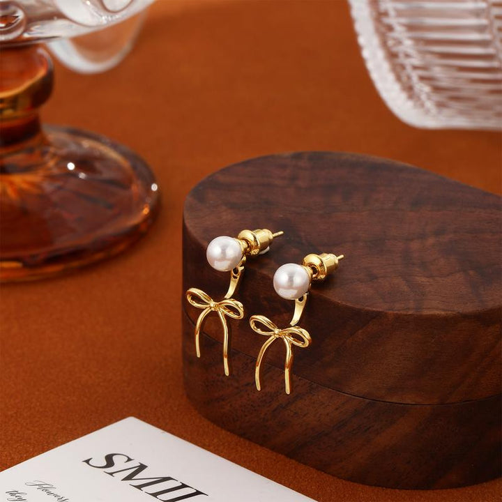 14k Pearl Accented Dangle Bow Earrings