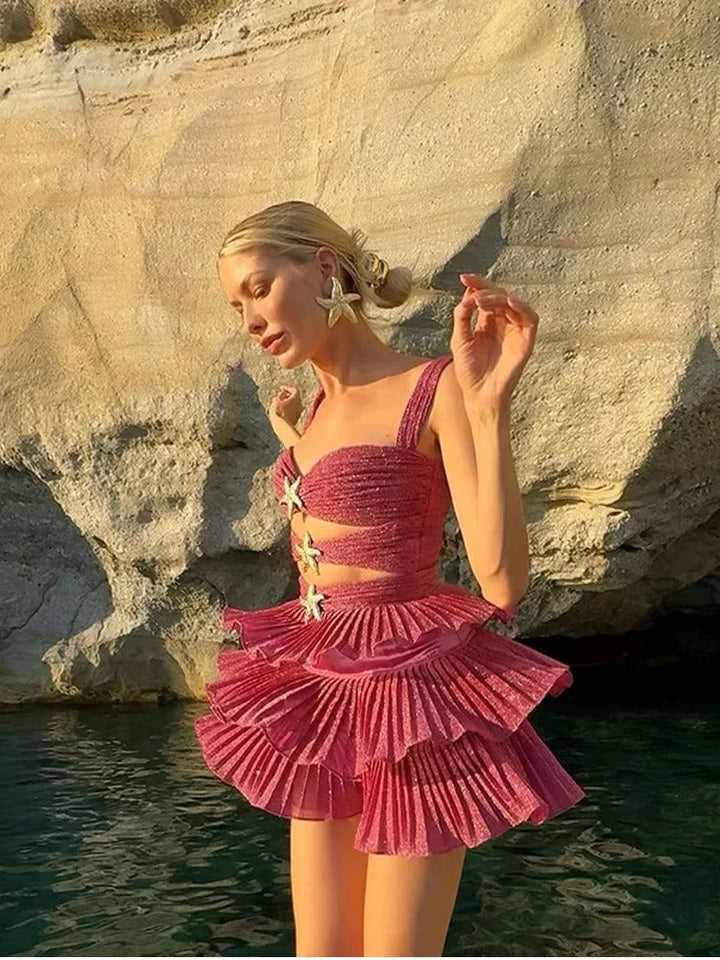 Monica Secrets | Slim Fit Mini Dress In Glittering Fabric With Cut-Out Waist And Ruffle Hem