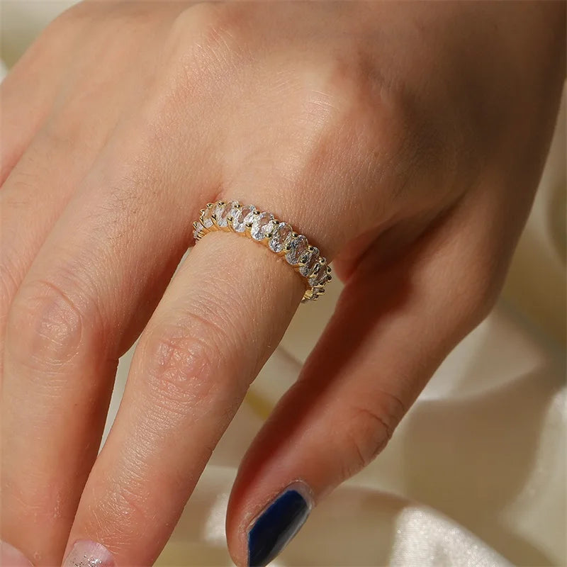 Dainty Oval Cut Diamond Adorned Ring