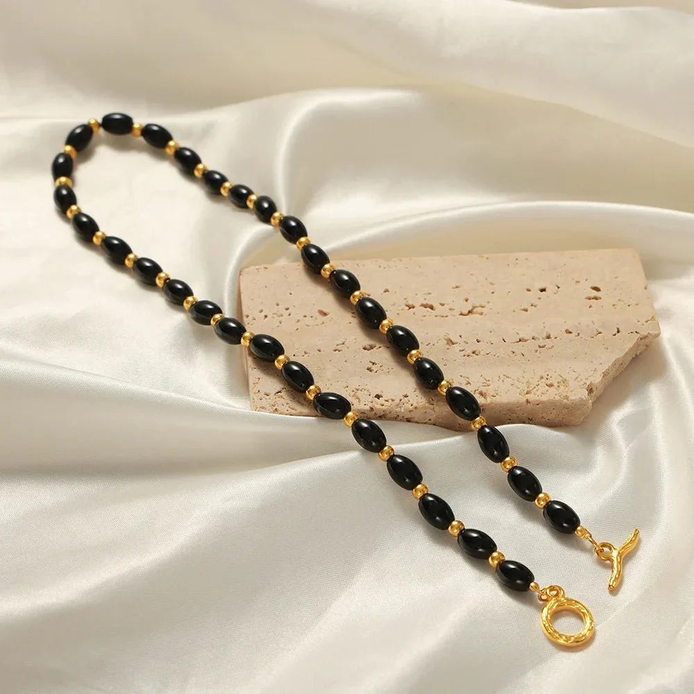 Boho Beaded Black and Gold Circle Clasp Necklace