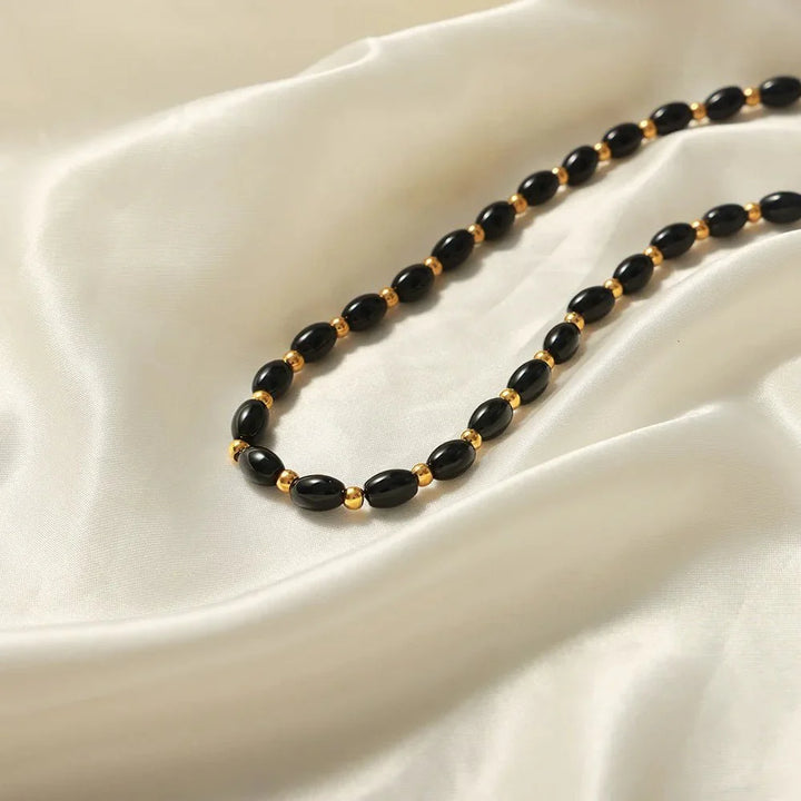 Boho Beaded Black and Gold Circle Clasp Necklace
